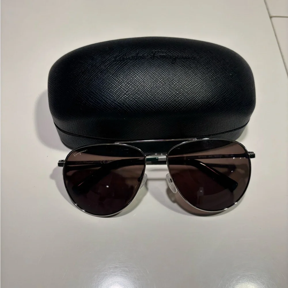 Ferragamo men sunglasses worn twice